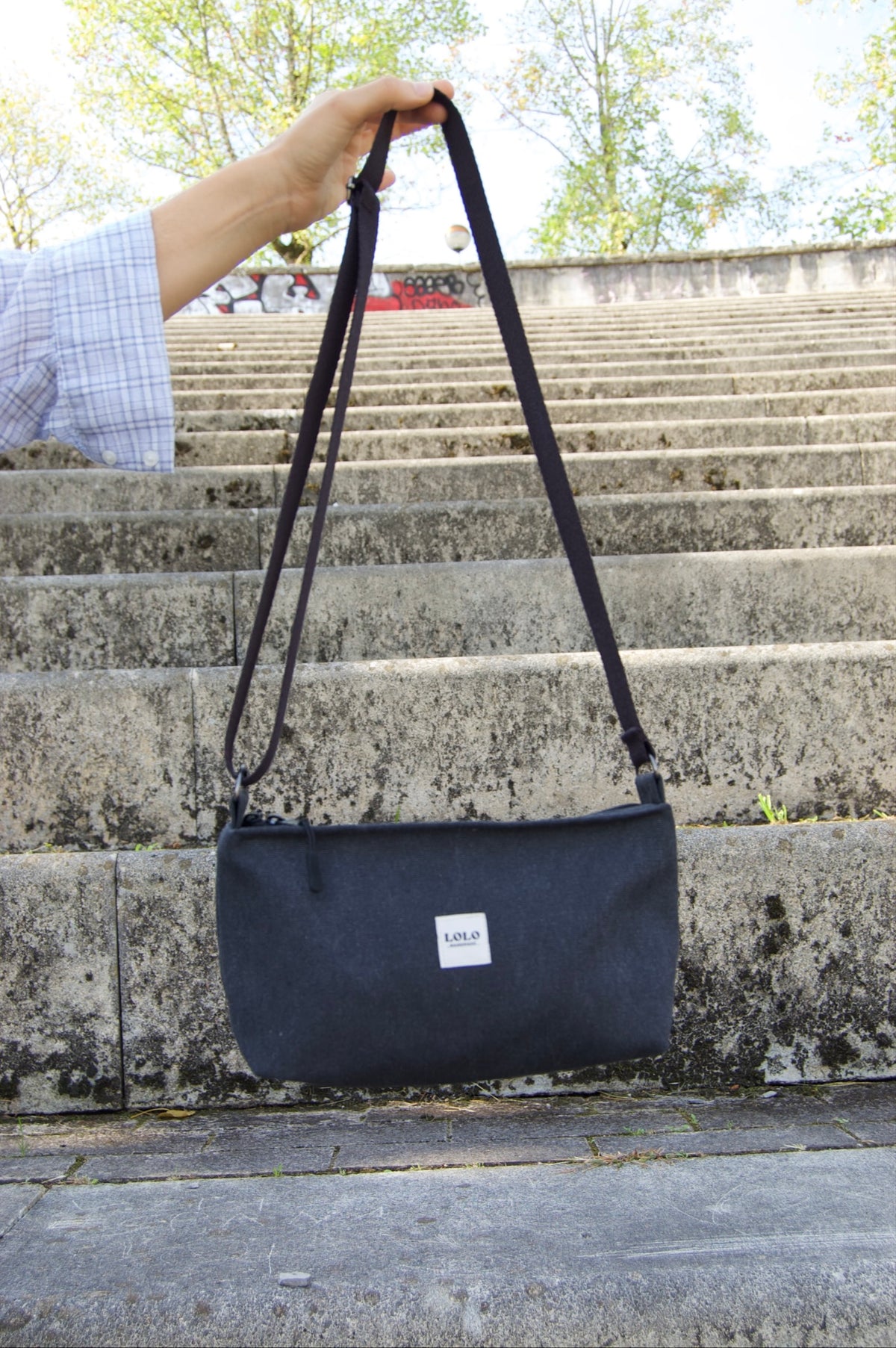 Bolso rectangular negro jaspeado
