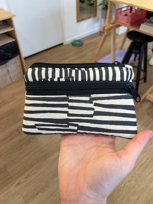 Cartera líneas impermeable