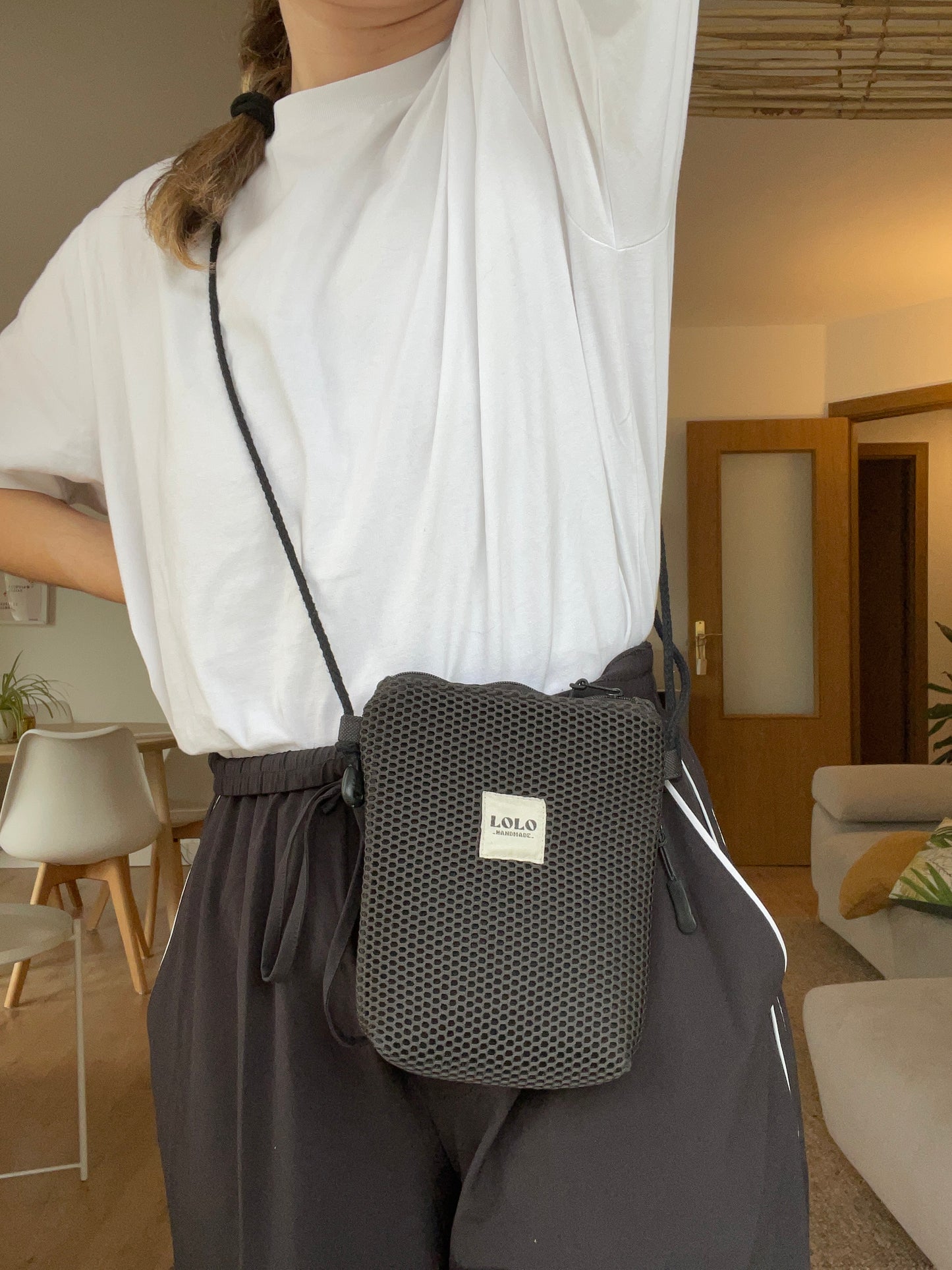 Bolso porta móvil malla 3D negro