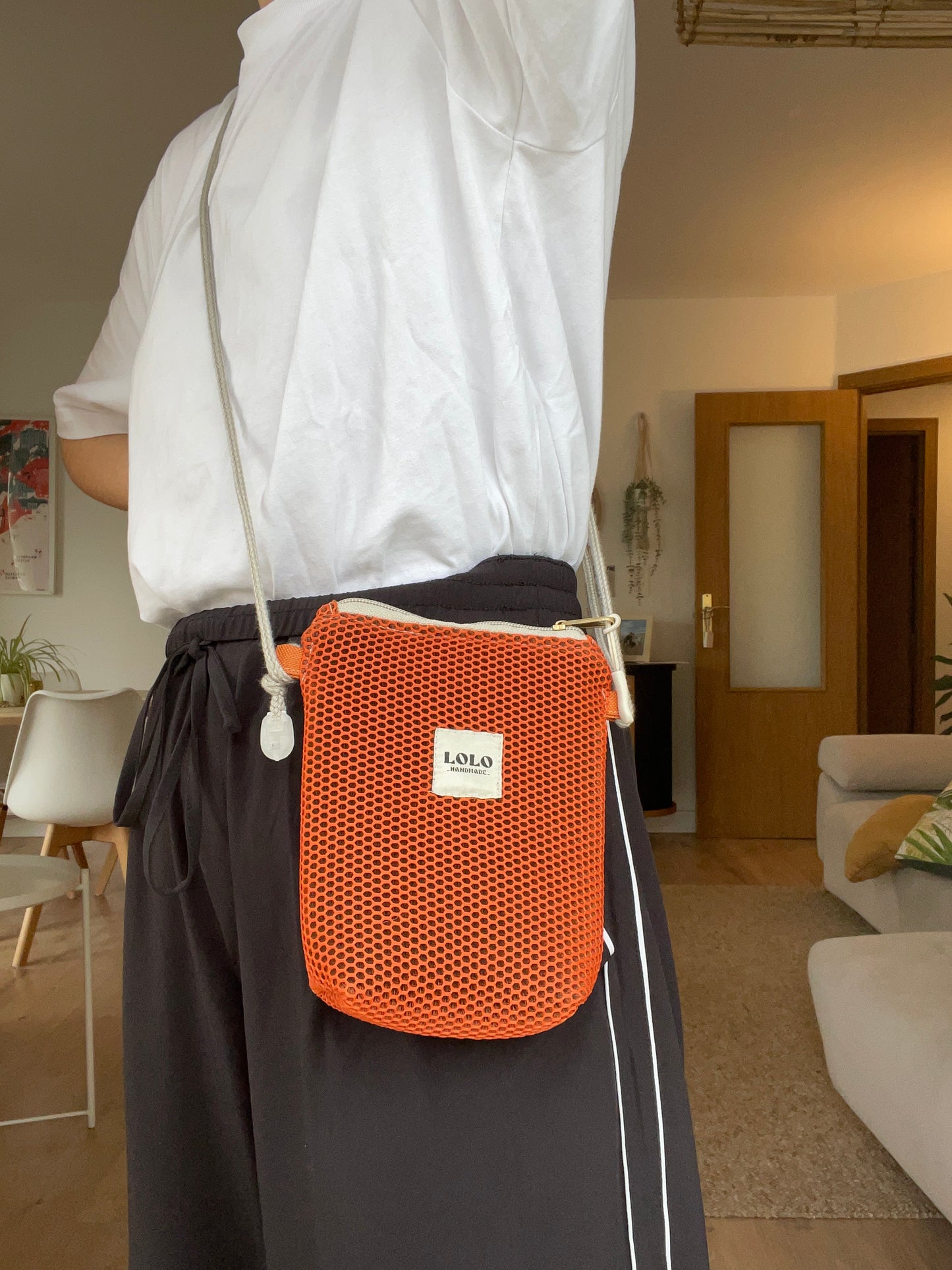 Bolso porta móvil malla 3D teja